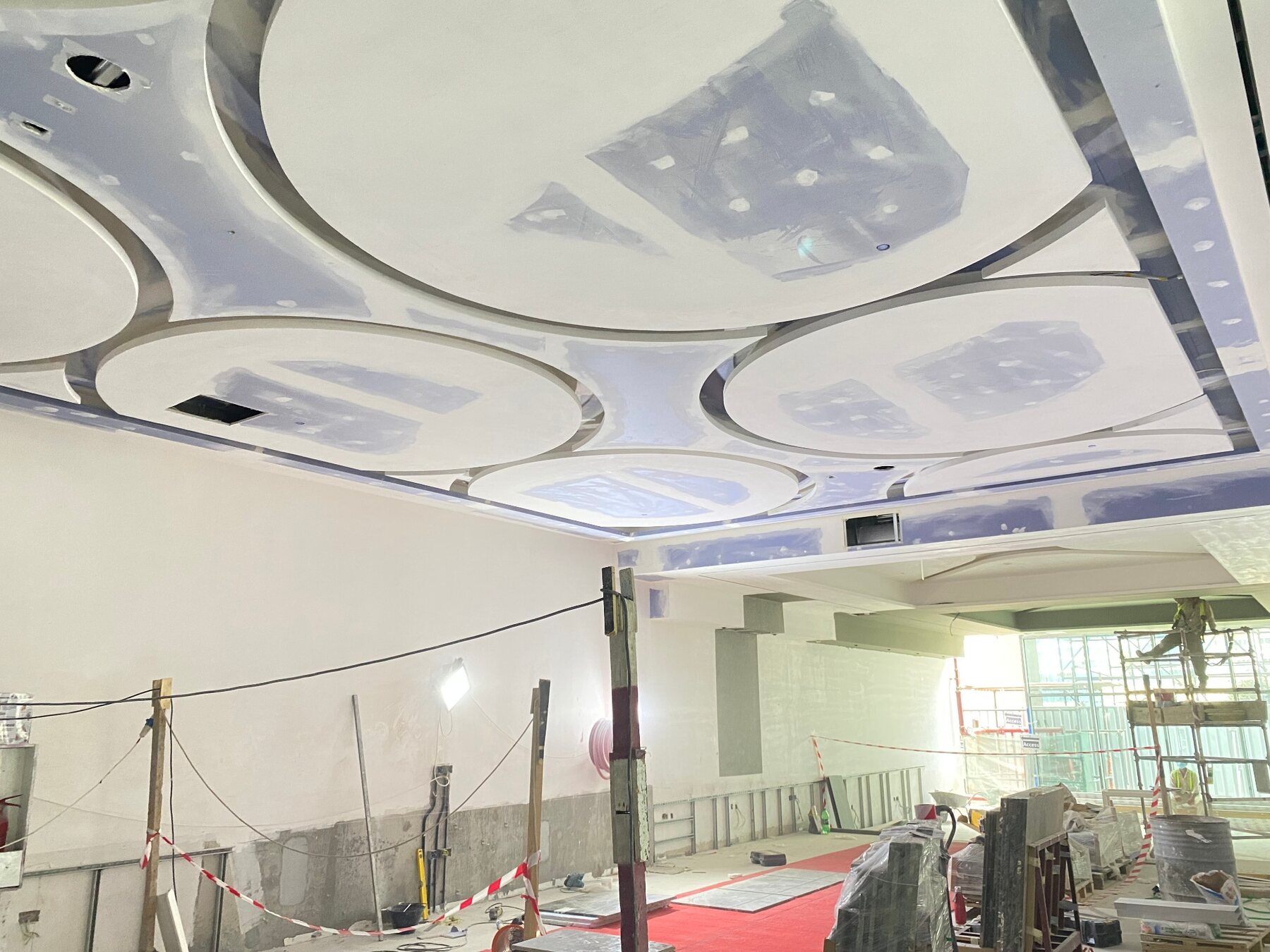Large decorative gypsum feature ceiling during installation